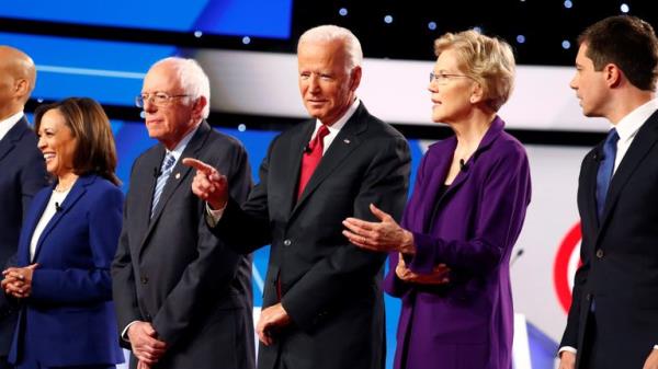 Senator Kamala Harris, Senator Bernie Sanders, former Vice President Joe Biden, Senator Elizabeth Warren and South Bend Mayor Pete Buttigieg wait o<em></em>nstage before the fourth Democratic U.S. 2020 presidential election debate in Westerville, Ohio Tuesday