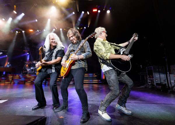 (L-R) Bruce Hall, Dave Amato and Kevin Cro<em></em>nin of REO Speedwagon perform at Pine Knob Music Theatre on June 08, 2022 in Clarkston, Michigan.