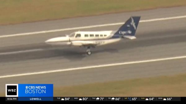 Still of the plane touching down