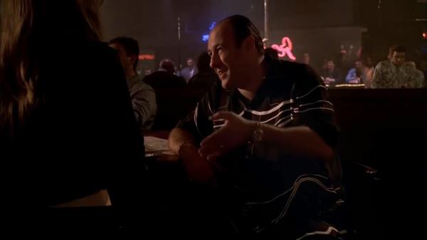 A photo of James Gandolfini playing Tony Soprano at The Bada Bing.