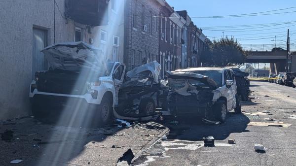 The two totaled pickup trucks after the crash.