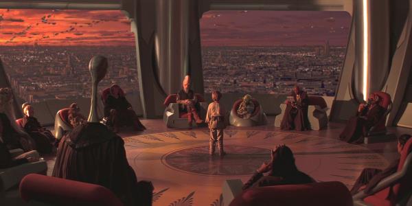 Young Anakin Skywalker stands in front of the Jedi Council in The Phantom Menace.