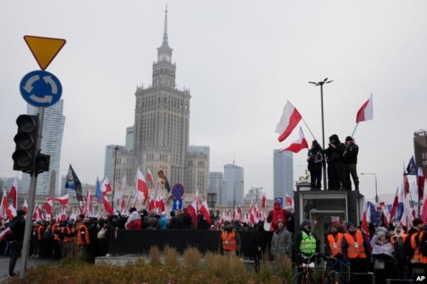 People take part in Independence Day march organized by far-right groups in Warsaw, Poland, Nov. 11, 2024.